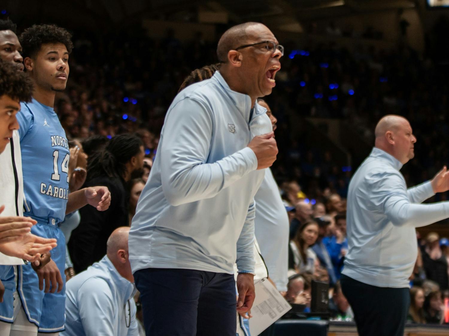 UNC Head Coach Hubert Davis shouts during the men's basketball game against Duke on Feb. 4, 2023 at Cameron Indoor Stadium. UNC lost 63-57.