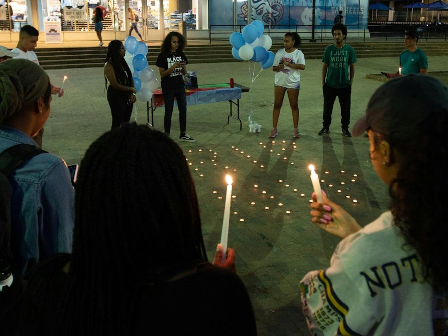 The Young Ethiopian Eritrean Tribe hosted a vigil commemorating the life of Eritrean American rapper Nipsey Hussle, who was shot outside of his clothing store in Los Angeles. The vigil took place on Wednesday, April 10, 2019 in the Pit. Members held candles and shared poems, art and words with one another about the rapper's death and legacy.