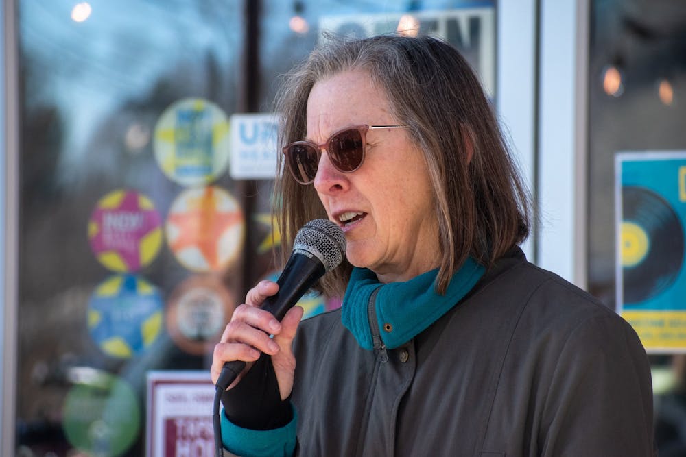 Melissa McCullough, a Chapel Hill resident, speaks at the Transit Equity Day hosted by NEXT at Steel String Brewery on Saturday, Feb. 4, 2023.