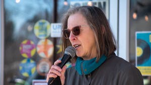 Melissa McCullough, a Chapel Hill resident, speaks at the Transit Equity Day hosted by NEXT at Steel String Brewery on Saturday, Feb. 4, 2023.