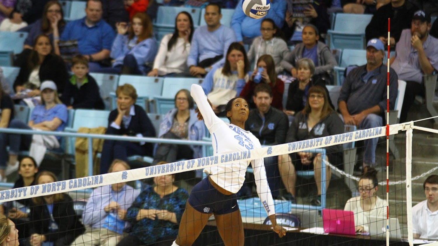 Outside Hitter, Taylor Leath (43), goes up for a hit against Clemson. The Tar Heels swept Clemson 3-0. 
