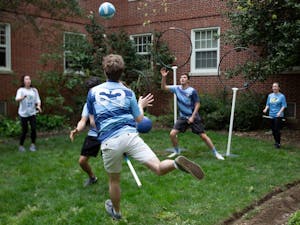 The Carolina Quidditch team plays outside Cobbwarts, an event hosted in Cobb Dorm by the Residence Hall Association on April 6, 2019. "So there's this Cobbwarts event going on and, you know, of all the people on campus, we really like Harry Potter," said Sam Nielsen (63), a junior economics and computer science major.