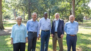 Former UNC historian Cecelia Moore, Burton Craige ('75), Walter Jackson ('67), Bill Taylor ('66), and Hugh Stevens ('65), the core conspirators behind the Silent Sam lawsuit, stand atop the area where the former Confederate Monument once sat on Friday, Sept. 16. 2022.