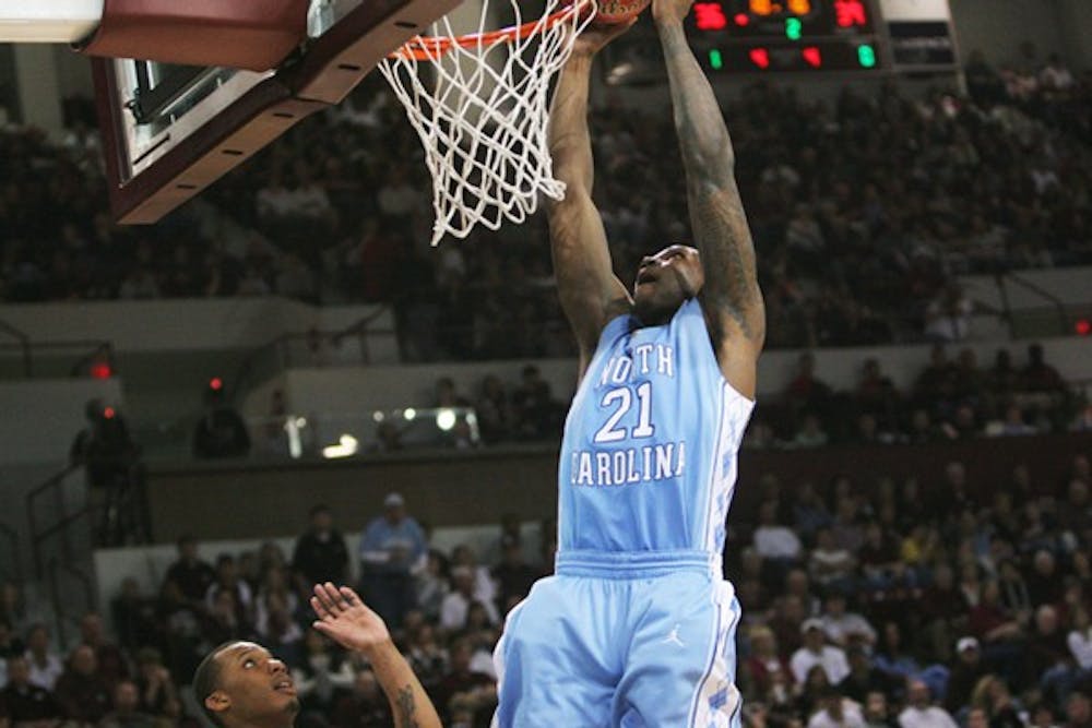 Deon Thompson slams one of his four field goals Saturday in North Carolina’s win against Mississippi State. DTH/Jordan Lawrence
