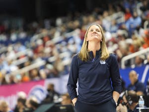 Courtney Banghart, head coach of Carolina Women's Basketball, reacts to a controversial call during a the quarterfinals of the ACC Women's Basketball Tournament against Virginia Tech at the Greensboro Coliseum. Virginia Tech won 87-80 in overtime.