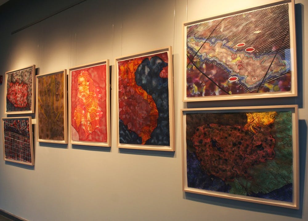 elin o’Hara slavick’s ink, watercolor, color pencil and gouache paintings are on display in the FedEx Global Education Center. They are part of the artist-professor’s collection “Protesting Cartography: Places the U.S. Has Bombed.”