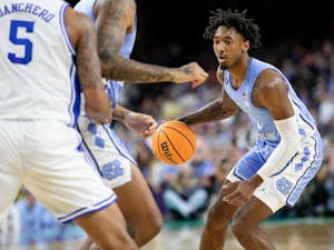 UNC senior forward Leaky Black (1) opens a possession during the Final Four of the NCAA Tournament against Duke in New Orleans on Saturday, April 2, 2022. 