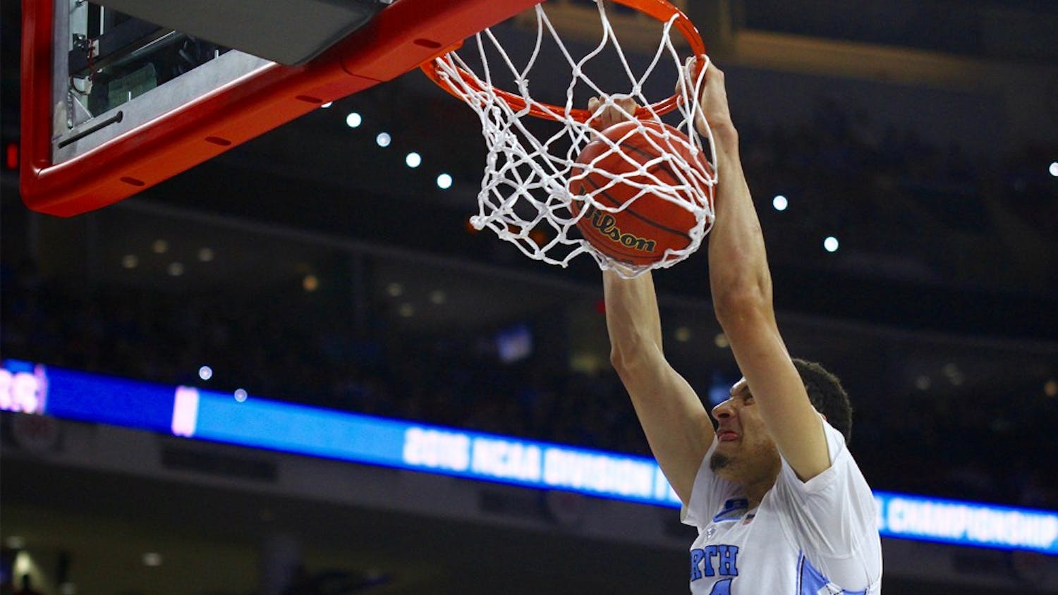 Sophomore Justin Jackson (44) dunks the ball during the ACC Tournament Championship game against Virginia on March 12.