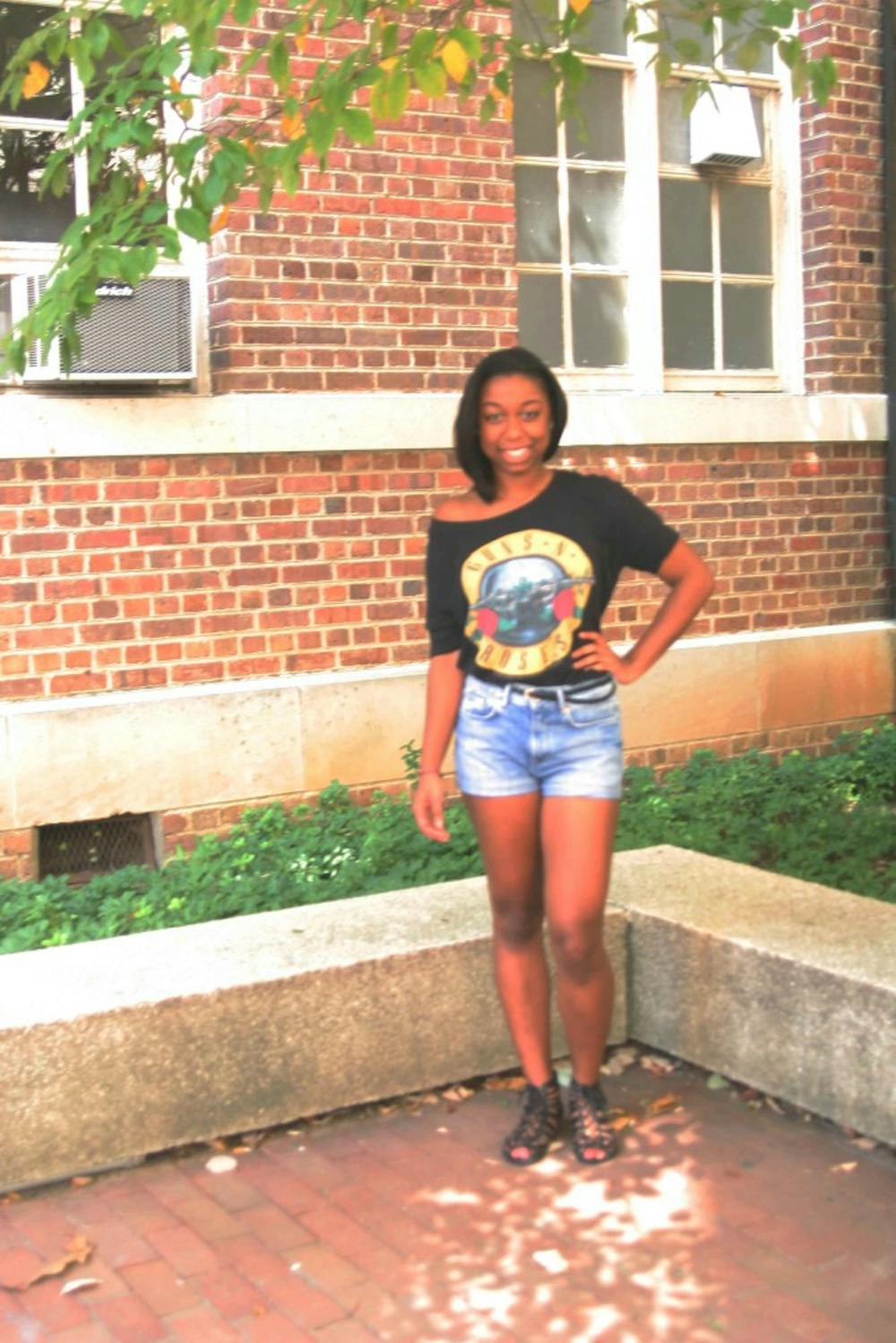 	<p>Simone Trotman enjoys the sunny weather with a concert tee and high wasted shorts.</p>