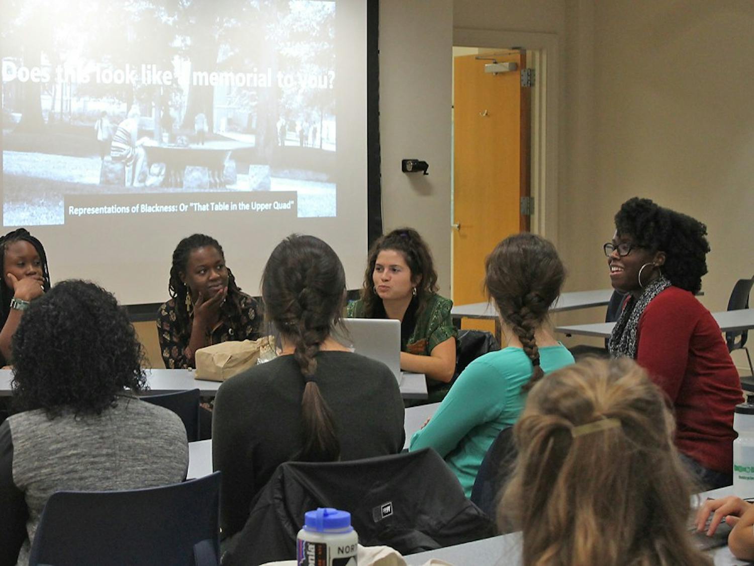 Students gather in Saunders Hall for “Representations of Blackness: That Table on the Upper Quad,” a roundtable discussion on campus memorials.