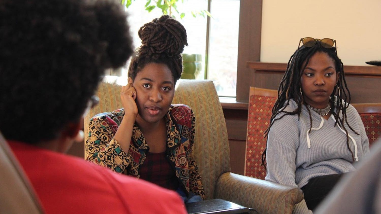 UNC students,  Nagwa Nakuna and Amu Muyanga, discuss matters on race in an activism conference hosted by UNC's Black Congress. 
