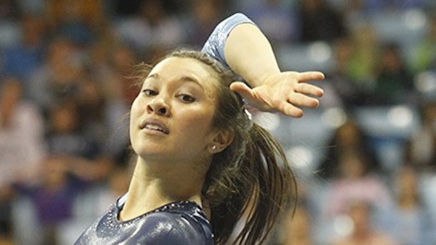 	North Carolina senior Kristin Aloi performs in the floor exercise against N.C. State Sunday. UNC held off the Wolfpack for its first victory.