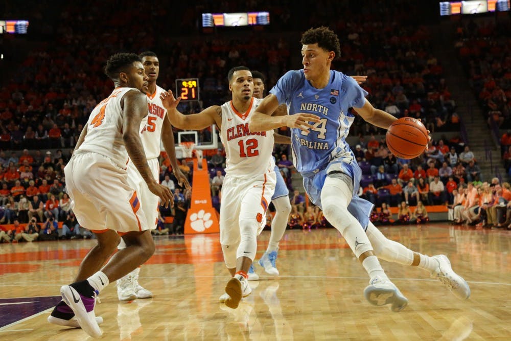 UNC-CH forward Justin Jackson (44) drives to the basket against Clemson on Tuesday night.