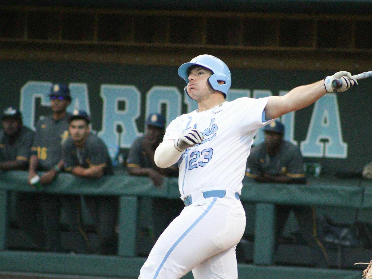 Designated hitter Alberto Osuna (23) hits a foul ball during a baseball game against North Carolina A&T. UNC lost 6-7 at home on Tuesday, April 12, 2022.