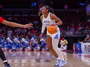 UNC junior guard Deja Kelly (25) dribbling the ball during UNC’s NCAA Tournament first-round game against the St. John’s Red Storm in the Schottenstein Center in Columbus, Ohio on Saturday, March 18, 2023.