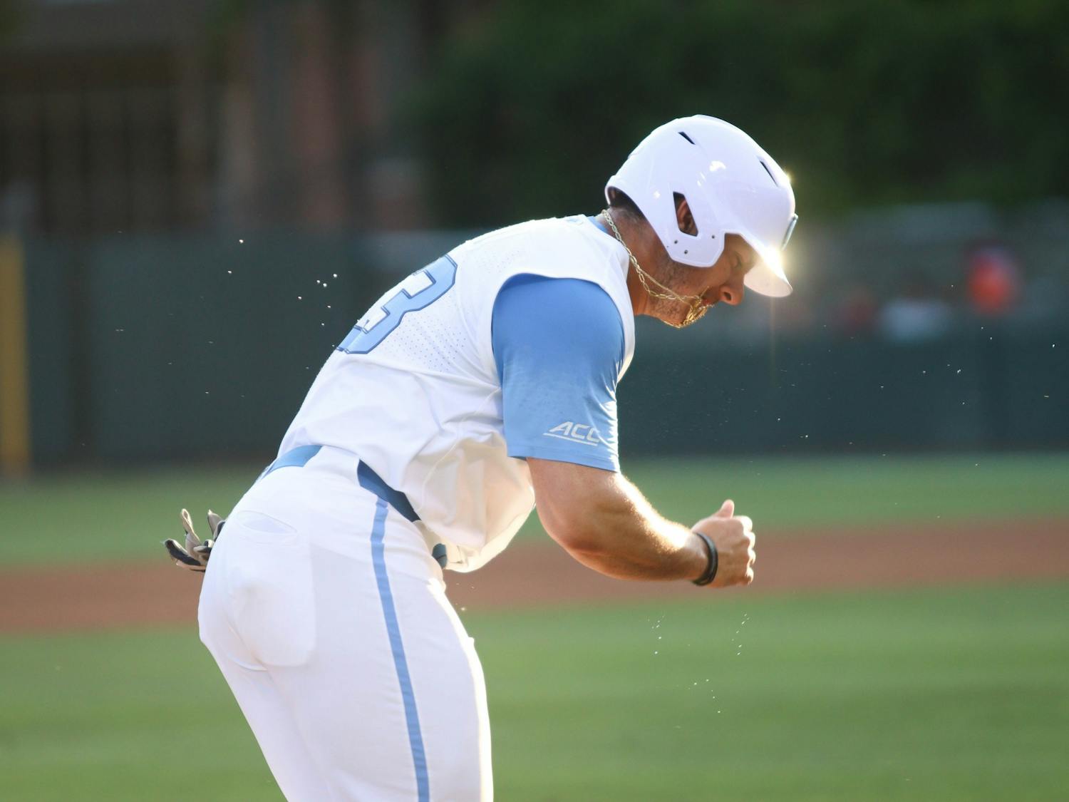 Sophomore designated hitter Alberto Osuna (23) runs towards home base. UNC won 10-4 against FSU at home in the second game of the three-game series on Friday, May 20, 2022.
