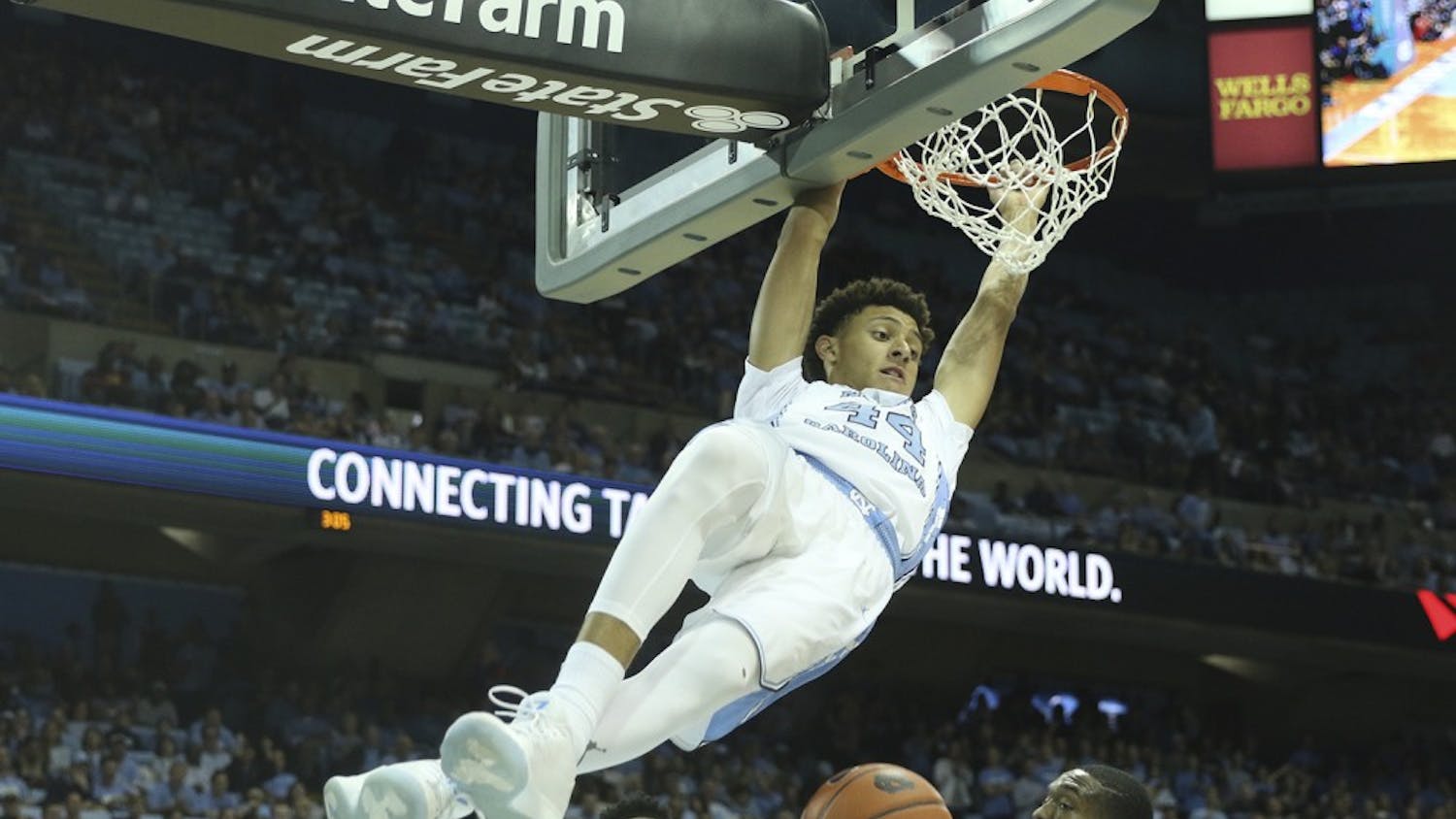 UNC forward&nbsp;Justin Jackson (44) throws down a dunk against Davidson on Dec. 4, 2016. UNC takes on Virginia Tech on Thursday at 8 p.m. in Chapel Hill.