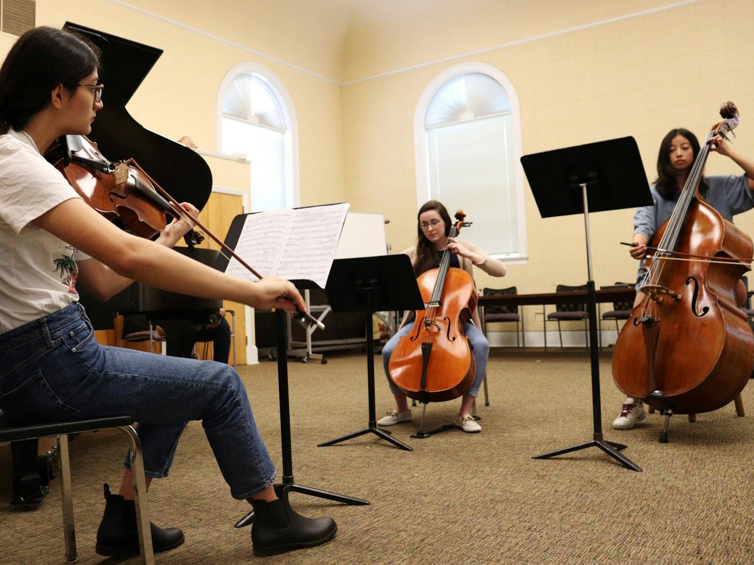 UNC Chamber Players, Natalie Druffner (first-year), Olivia Fults (sophomore) and Cindy Xu (sophomore), played for students sitting-in on their rehearsal during Arts Everywhere Day on April 14, 2023.