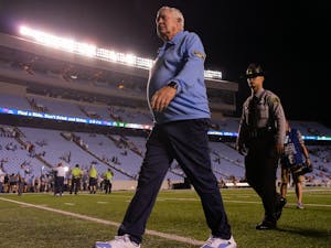 Head coach Mack Brown walks off the field after the game versus Florida A&M at Kenan Stadium n Aug. 27. The Heels won 56-24.