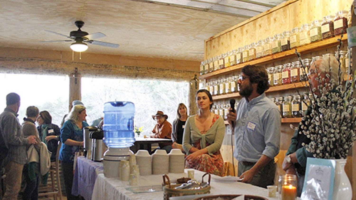 Tim & Megan Toben speak to friends and supporters of their project, The Honeysuckle Tea House outside of Carrboro in Chapel Hill, on Saturday March 22nd 2014. The Tea House is a collaborative project that began with a kickstarter page. It's set to open this March