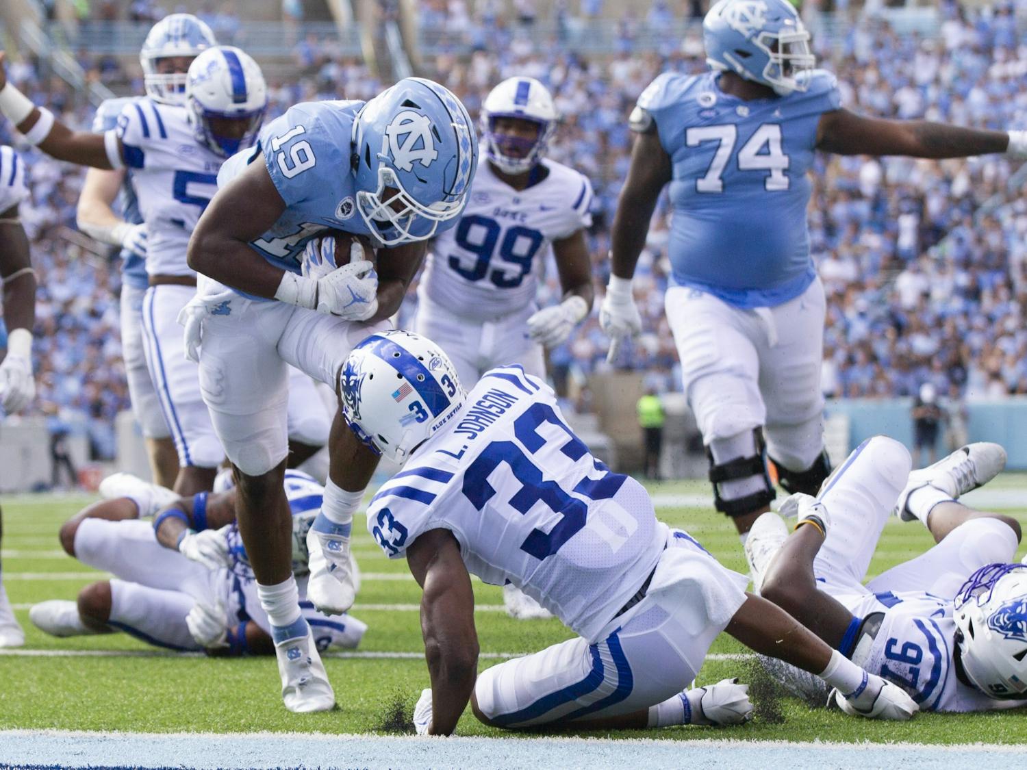 Graduate running back Ty Chandler (19) enters the end zone and brings the Tar Heels lead over Duke to 31-7. The Tar Heels defeated Duke 38-7 in Kenan Memorial Stadium on Oct. 2, 2021.