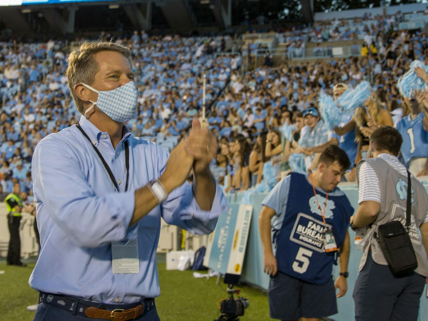 UNC Chancellor Kevin Guskiewicz greets students before the Tar Heels' home football matchup in Kenan Memorial Stadium on Sept. 18, 2021, against the University of Virginia Cavaliers. The Tar Heels won 59-39.