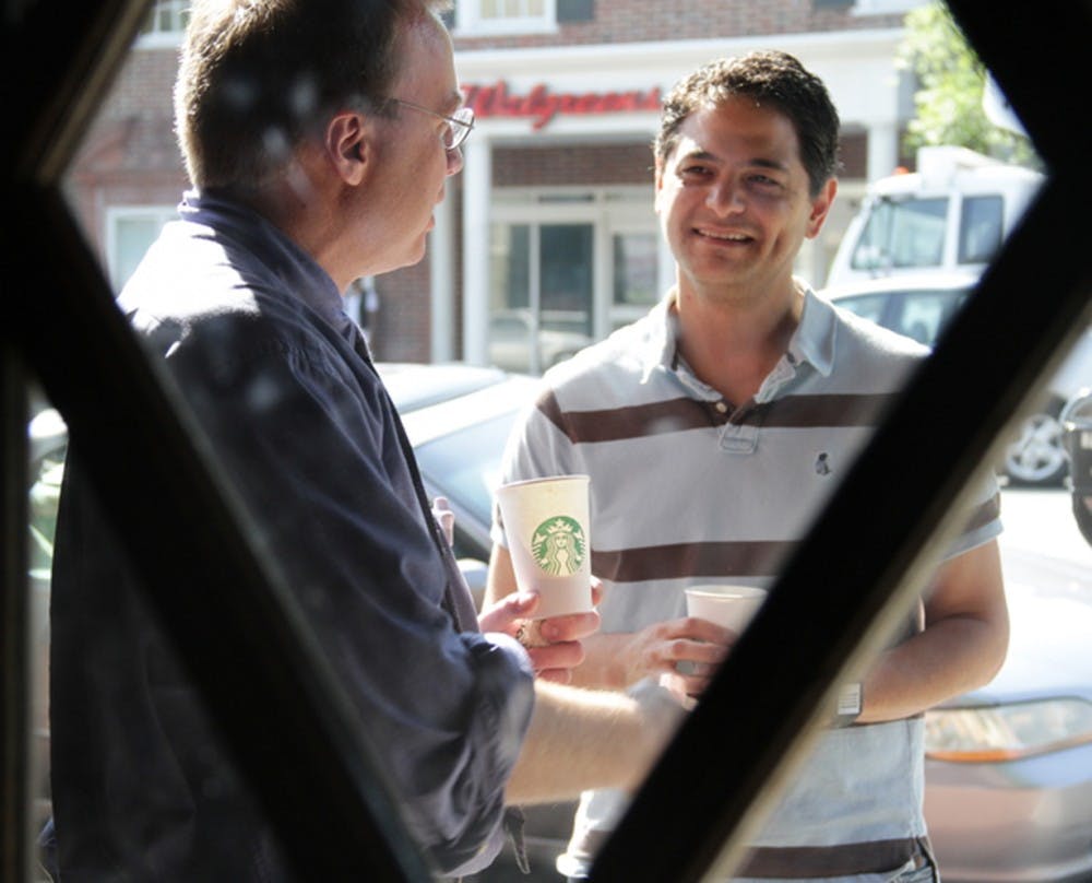 	<p>Chapel Hill Mayor Mark Kleinschmidt discussed the issue of alternative transportation with Carl Schuler, of <span class="caps">UNC</span> Hospitals, at the Starbucks on Franklin Street Wednesday. Kleinschmidt rode Chapel Hill Transit to talk to bus riders about the transportation system.</p>