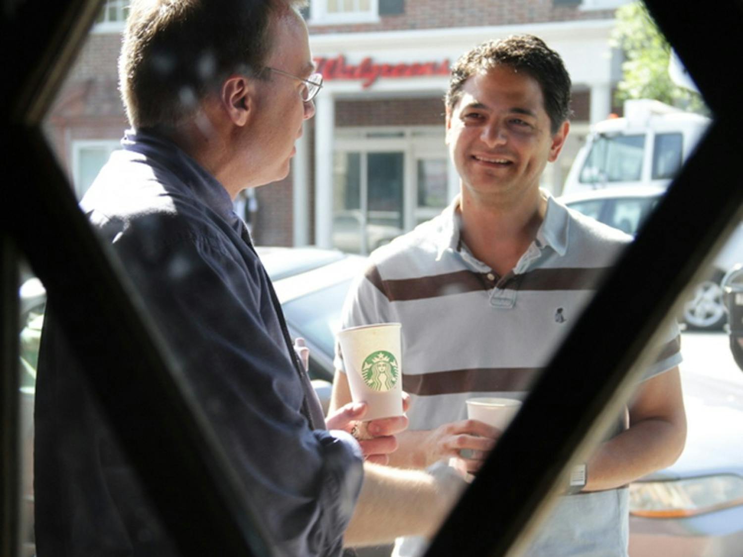 	Chapel Hill Mayor Mark Kleinschmidt discussed the issue of alternative transportation with Carl Schuler, of UNC Hospitals, at the Starbucks on Franklin Street Wednesday. Kleinschmidt rode Chapel Hill Transit to talk to bus riders about the transportation system.