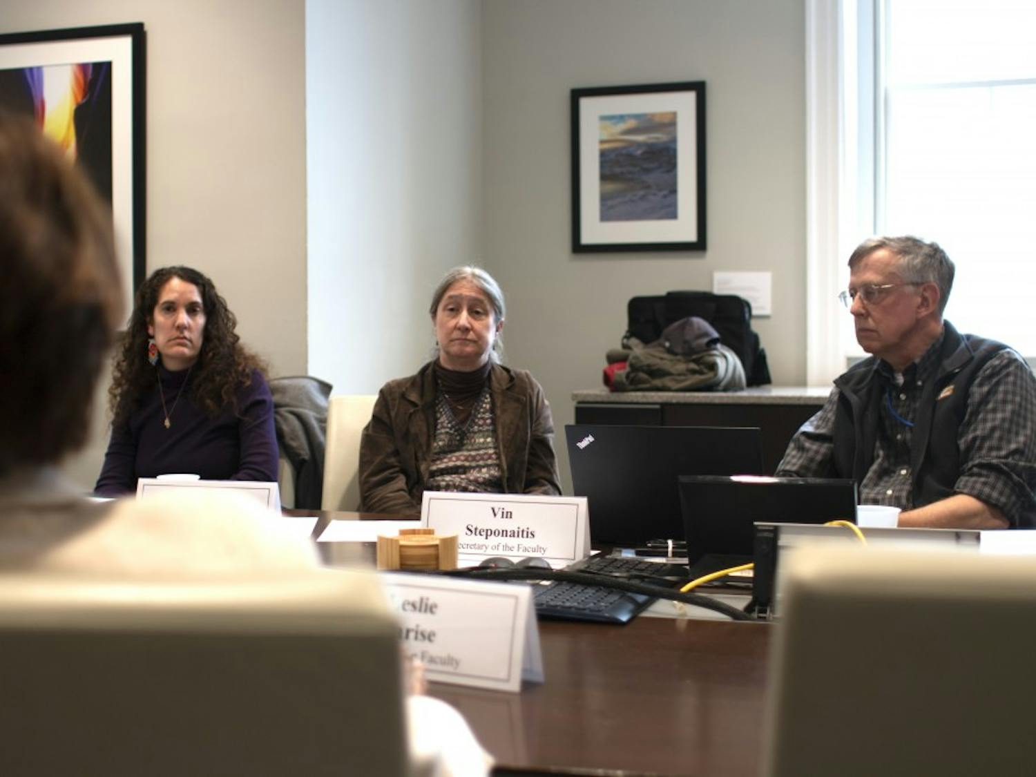 (From left) Ariana Vigil, Laurie McNeil and Secretary of the Faculty Vin Steponaitis, consider a point presented by Chair of the Faculty &nbsp;Leslie Parise regarding a revision of the Chancellor Advisory Committee's charge during a meeting in South Building on Wednesday, March 20, 2019. The revision concerned the committee's power to nominate candidates for Secretary and Chair of the Faculty.