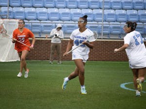 UNC sophomore defender Brooklyn Walker-Welch (45) runs across the field during the women’s lacrosse game against Clemson at Dorrance Field on Sunday, March 26, 2023.