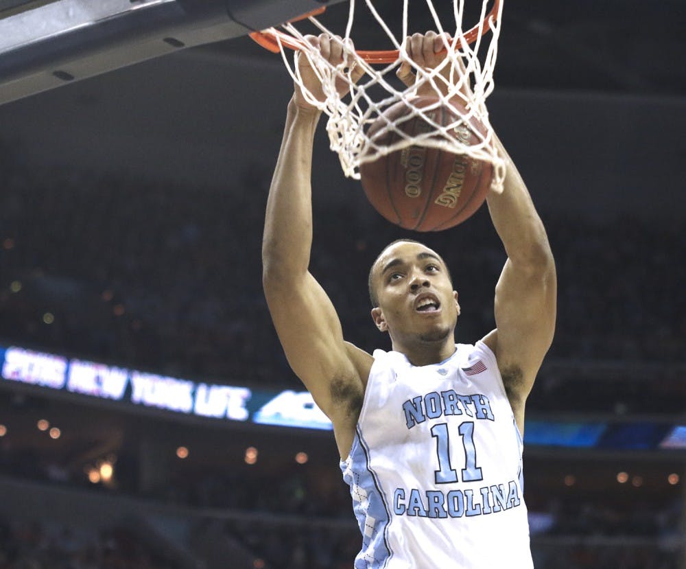 UNC forward Brice Johnson (11) dunks the ball during the 2016 ACC Championship March 12.
