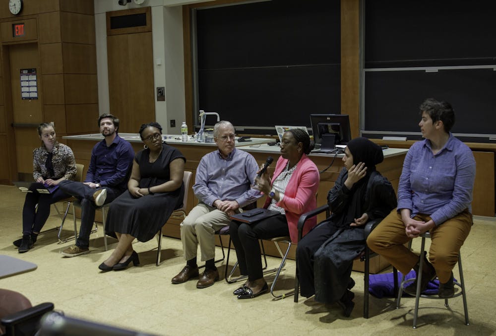<p>Organizers of the event answers questions at the residence hall renaming forum in Chapman Hall, Wednesday, Mar. 1, 2023.</p>