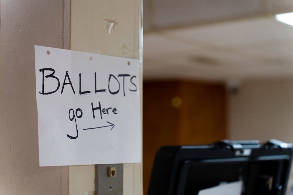 A sign indicating where to submit ballots at First Baptist Church in Chapel Hill on Election Day, Tuesday, Nov. 8, 2022.