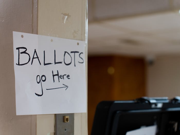 A sign indicating where to submit ballots at First Baptist Church in Chapel Hill on Election Day, Tuesday, Nov. 8, 2022.