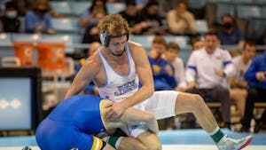 Redshirt senior Zach Sherman tries to free himself from a hold during the Tar Heel's match against Pittsburgh on Feb. 4th, 2022 at Carmichael Arena. UNC won 19-12.