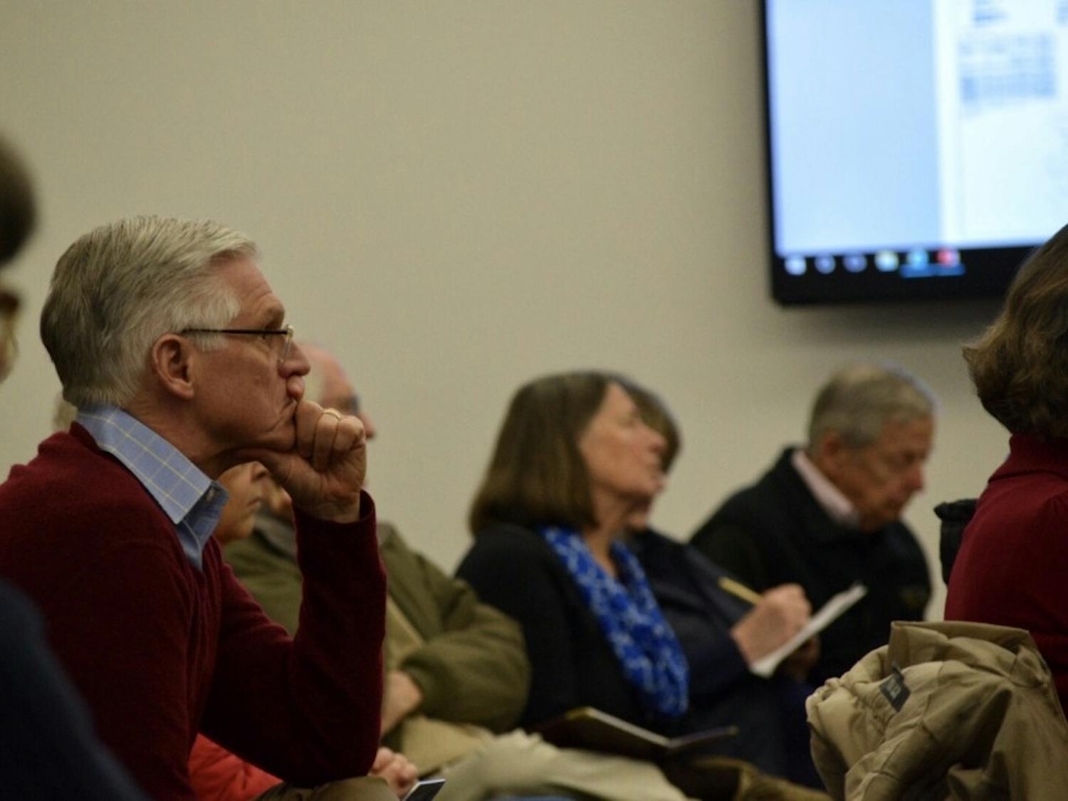 Citizens gather at the Chapel Hill Public Library to discuss the plans of the implementation of Wegman's, a supermarket chain, in Chapel Hill and traffic concerns on Monday, Feb. 25, 2019.