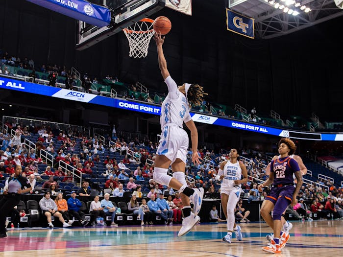 Junior guard Kennedy Todd-Williams (3) goes for a lay-up in the UNC women's basketball team's game against Clemson University in the second round of ACC Championship in Greensboro, NC. UNC won 68-58.