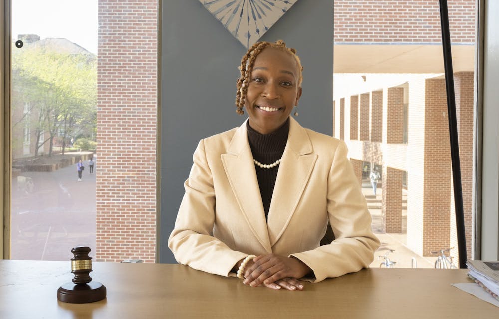 UNC senior and Student Body President Taliajah "Teddy" Vann sits in her office in the Frank Porter Graham Student Union on Thursday, March 23, 2023.