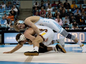 UNC's Zach Sherman, a redshirt sophomore at the time, wrestles against Arizona State redshirt junior Cory Crooks in Carmichael Arena on Sunday, Feb. 23, 2020.&nbsp;
