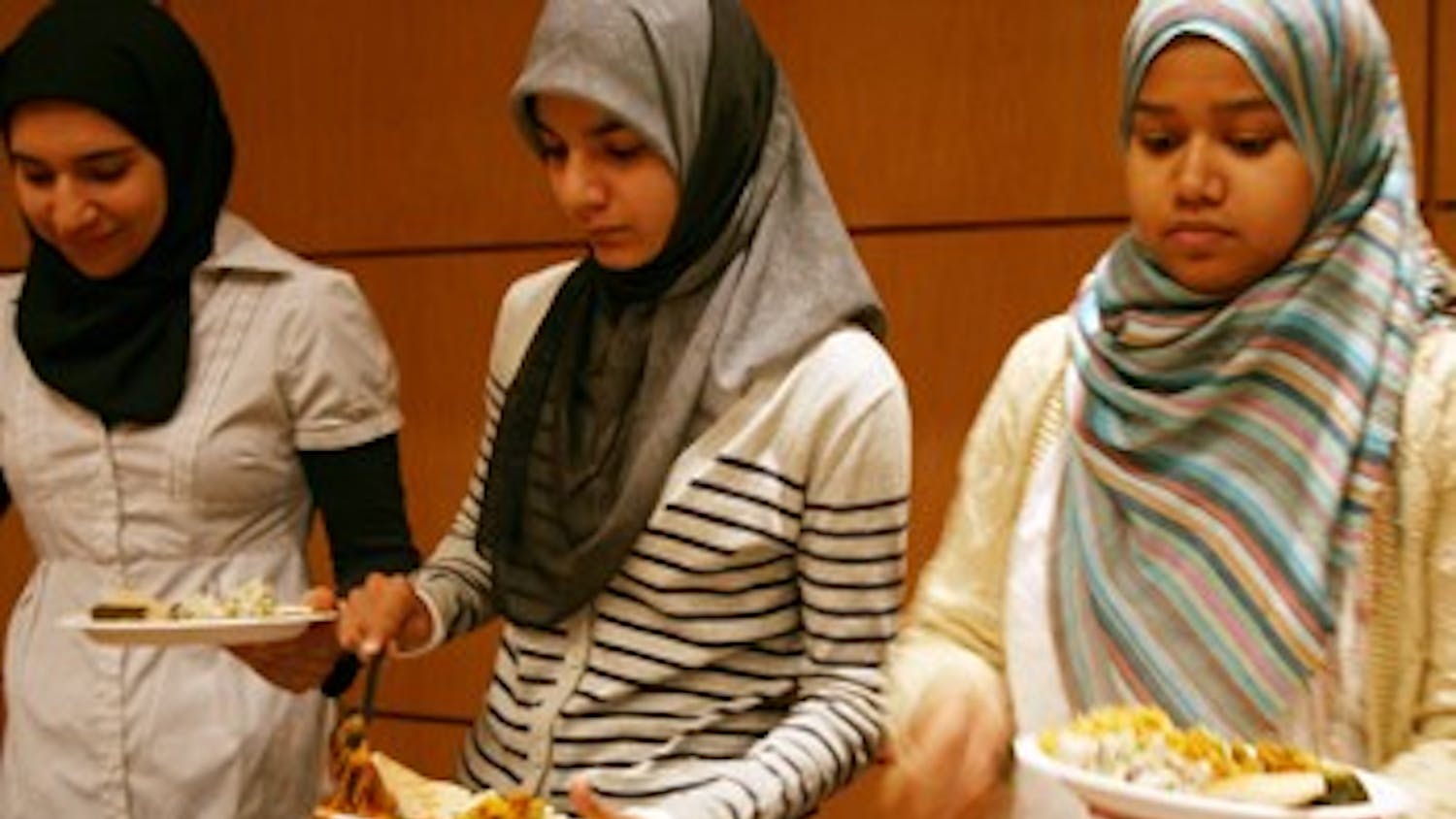 From right, Bushra Farooqui, a senior, and Umber Siddiqui, a freshman, are members of Sangam and the Muslim Student Association