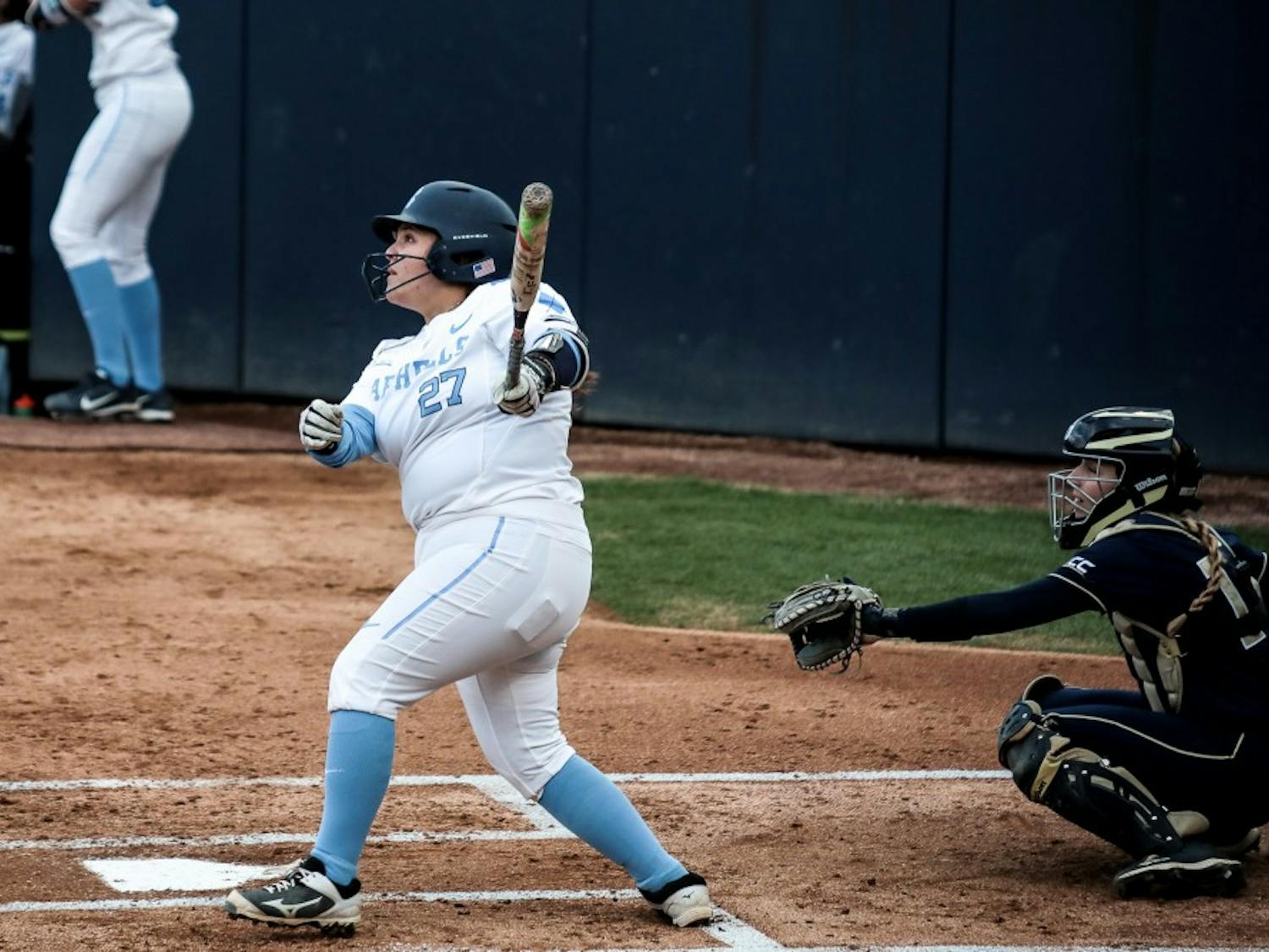 UNC senior third baseman Berlynne Delamora (27) looks in to the sky after hitting the ball during the 4-1 win over Georgia Tech on Friday, March 22, 2019 in Anderson Stadium in Chapel Hill, N.C. The Tar Heels improved their record to 6-1 in ACC play.