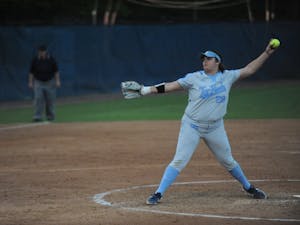 Junior Brittany Pickett, number 28, pitches the ball at the UNC  softball match against Liberty University on Wednesday, April 10, 2019 at the Anderson Softball Stadium. UNC won 3-2.