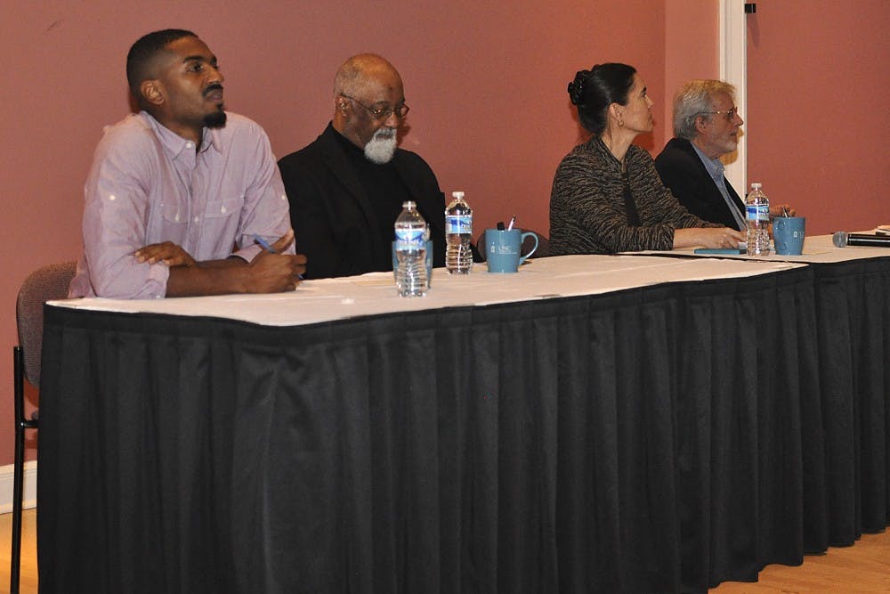 From left, Ori Burton, Irving Joyner, Anita Earls and Al McSurely participated in Thursday night's 50 Years After the Dream: Race and the Justice System Panel.