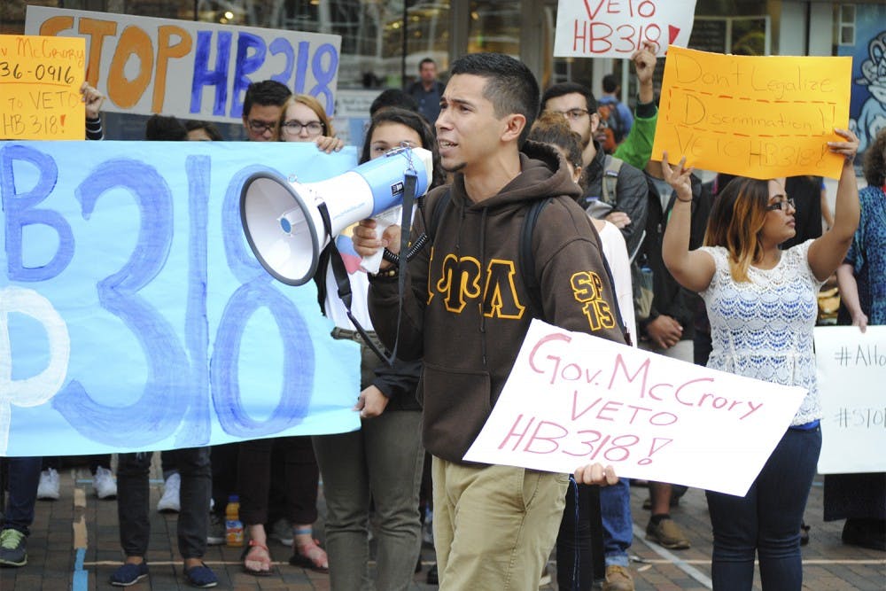 Sophomore Christopher Guevara, member of La Unidad Latina, Lambda Upsilon Lambda Fraternity, shared his personal story in the put in order to rally support for the protest for the HB 318, an anti-immigrant bill that would affect all undocumented residents and open doors for racial profiling.