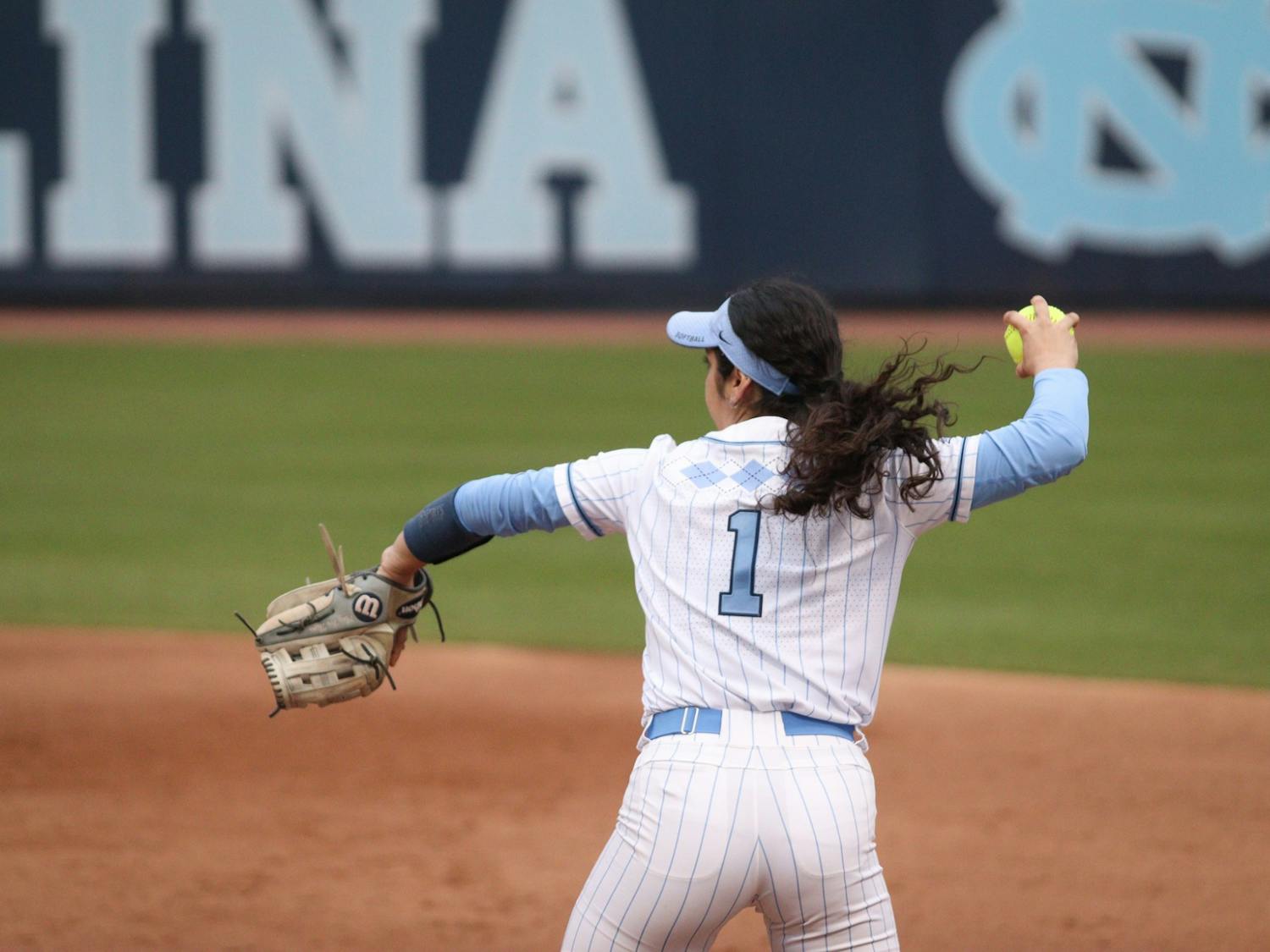 First baseman Kiersten Licea (1) gets ready to throw the ball back to the pitcher's mound during a home game against UNCW. The Heels won 2-0 on Tuesday, March 15, 2022.