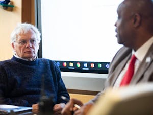 Chair of the Faculty Lloyd Kramer (left) listens as UNC Police Chief David Perry (right) speaks during a Faculty Executive Committee Meeting in South Building on Monday, Nov. 4, 2019. Perry emphasizes the need for the police force to build a rapport with their community.