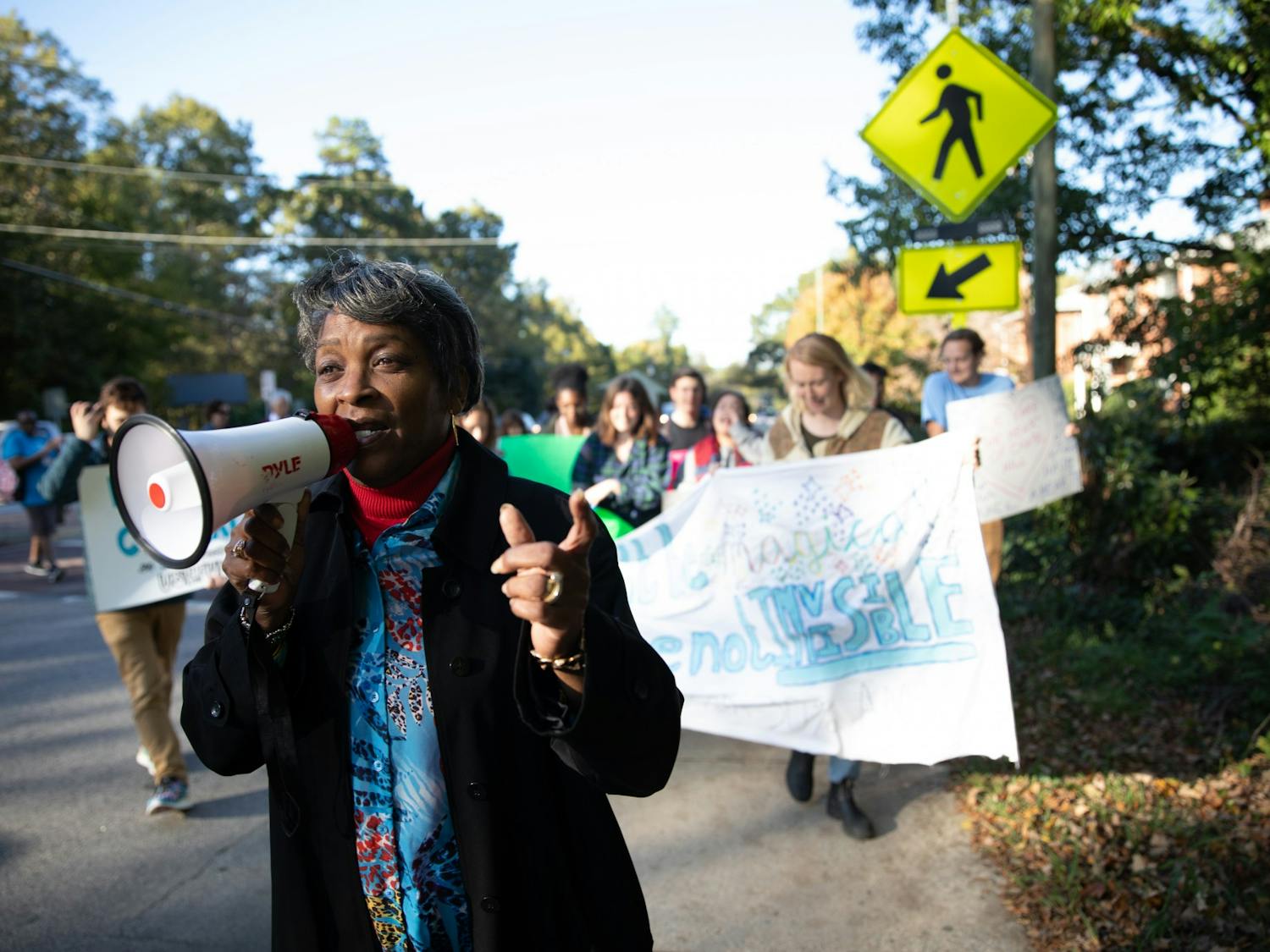 Protestors gathered in downtown Chapel Hill Friday to push the candidates of local elections to support more effective affordable housing policies.