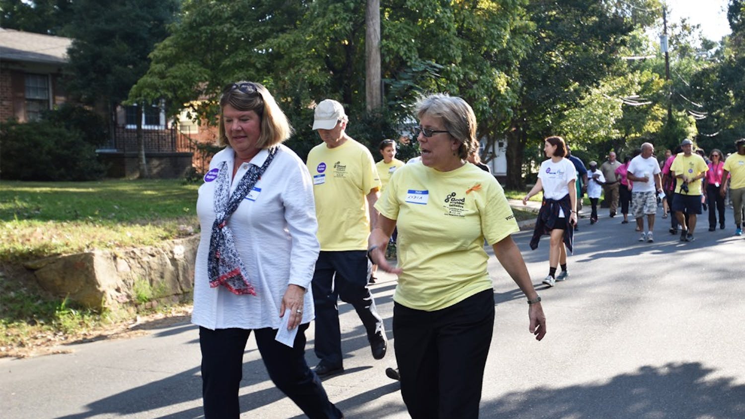 Mayor of Chapel Hill, Pam Hemminger and Mayor of Carrboro, Lydia Lavelle lead a walk around the neighborhood at the good neighbor block party at Hargraves Community Center on Tuesday evening. 
