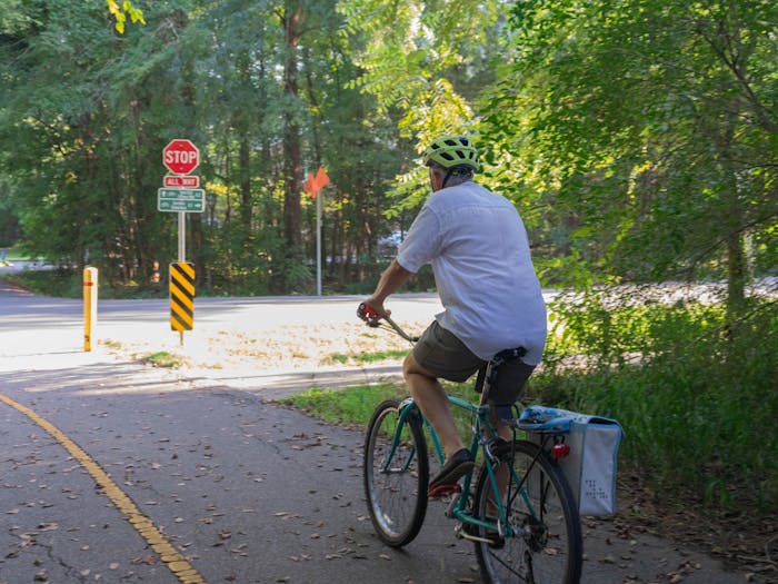 John Rees, President of Bicycle Alliance of Chapel Hill, rides his bike on the Frances Shetley bikeway, which is a part of the 17-mile, shared-use path.