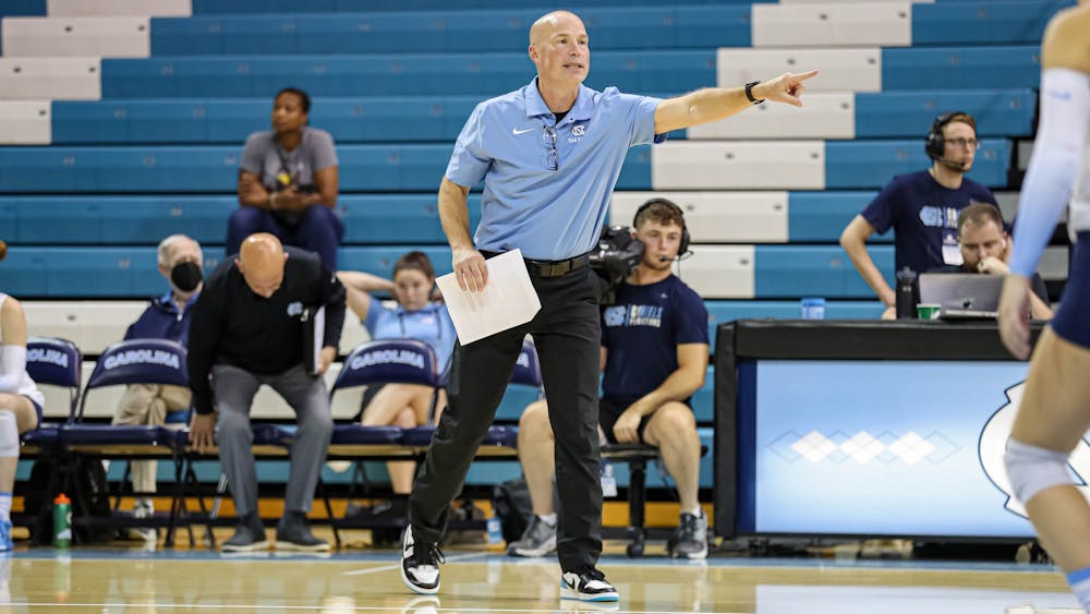 <p>Mike Schall coaches from the sidelines of the UNC volleyball game against South Carolina in Carmichael Arena on Friday, Sept. 2, 2022. Schall was named the new head coach of the program on Wednesday, Feb. 15, 2023.<br>
Photo Courtesy of Carolina Athletics.</p>